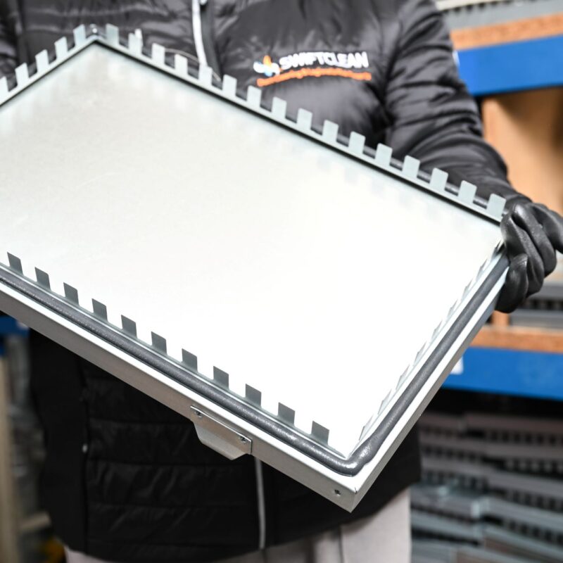 Swiftclean engineer removing ductwork access panel for inspection